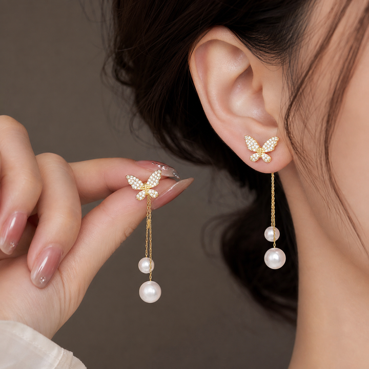 Solenne Wing Pearl Drop Earrings