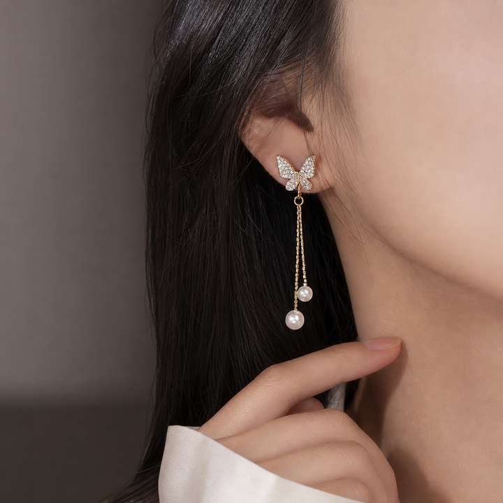 Solenne Wing Pearl Drop Earrings