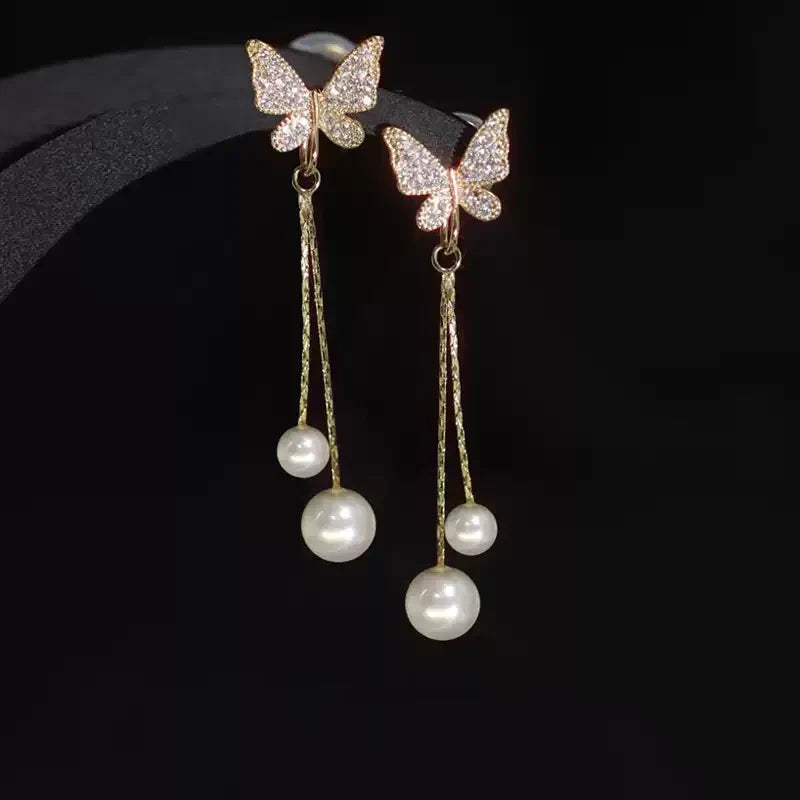 Solenne Wing Pearl Drop Earrings