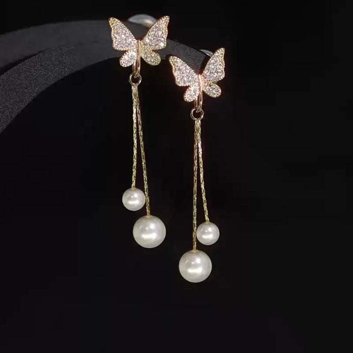 Solenne Wing Pearl Drop Earrings