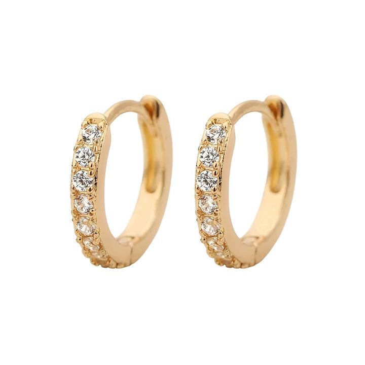 Hoops with white zirconias in 14-carat gold-plated copper. Multiple sizes