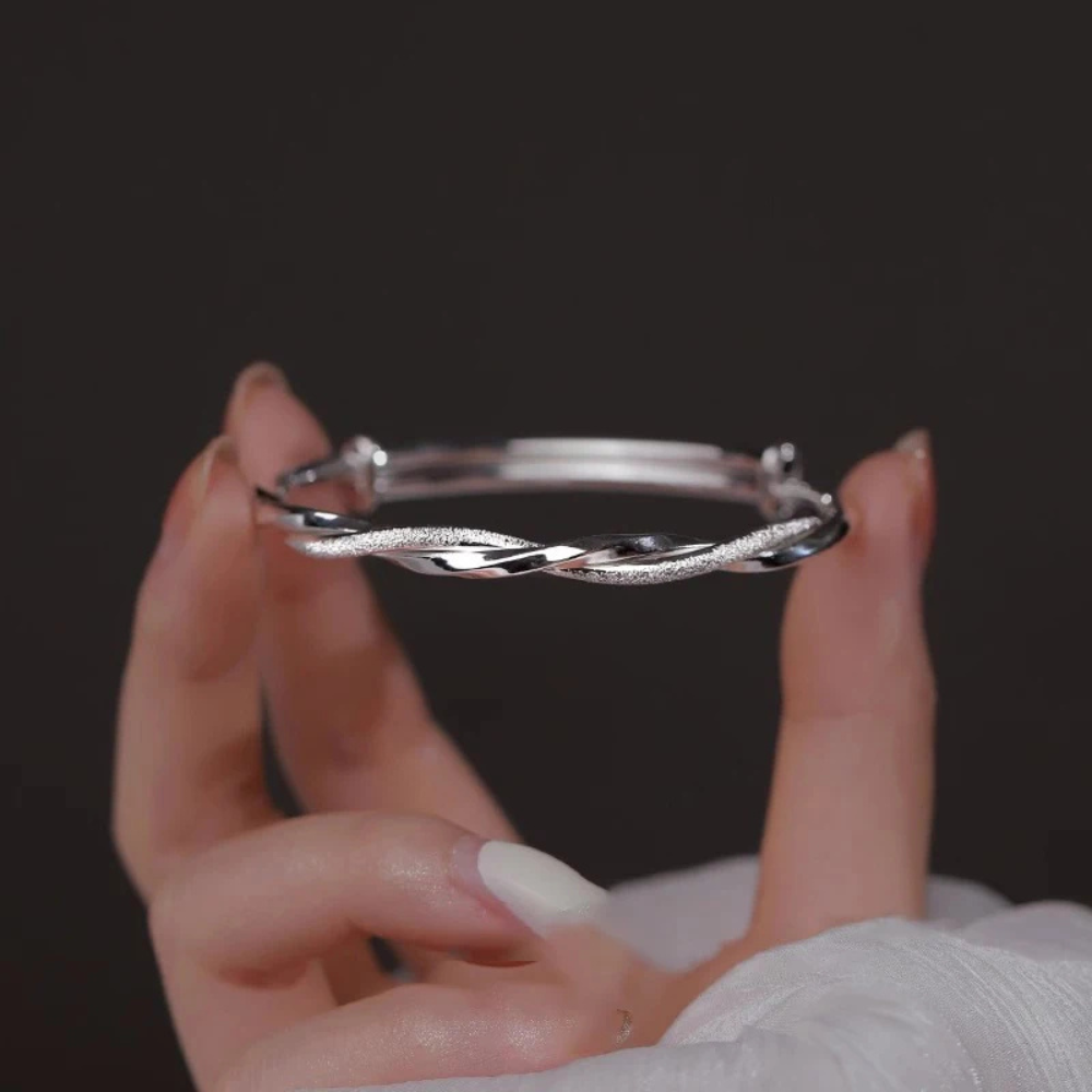 TWISTED SILVER BANGLE (ADJUSTABLE)