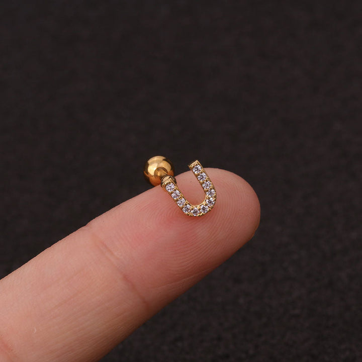 Letter earrings with zirconias and ball lock in 18 karat gold-plated stainless steel