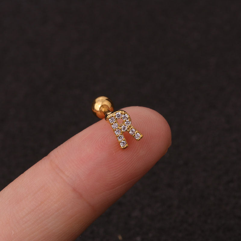 Letter earrings with zirconias and ball lock in 18 karat gold-plated stainless steel