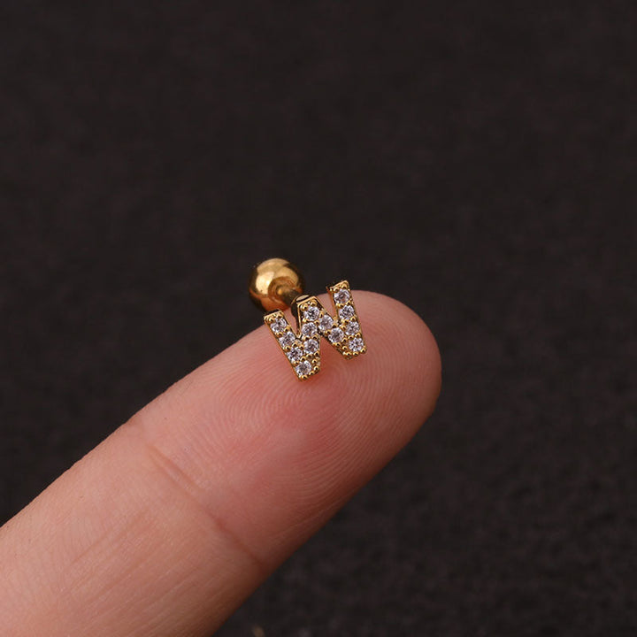 Letter earrings with zirconias and ball lock in 18 karat gold-plated stainless steel