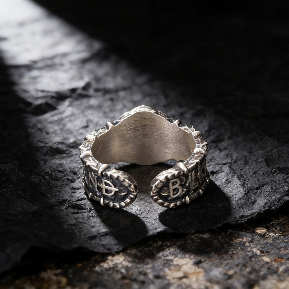 Gilded Mask Rune Embossed Ring