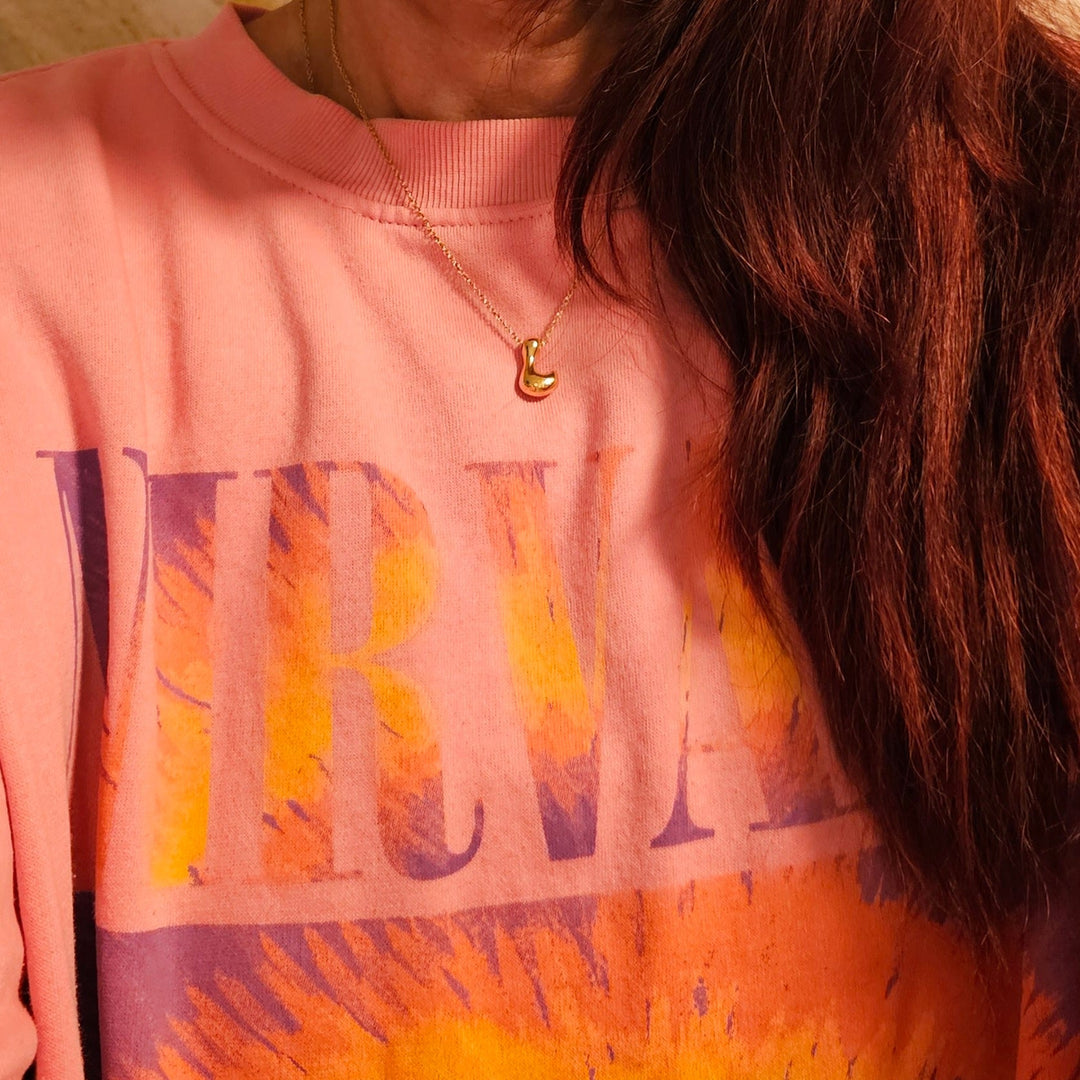 Necklace with balloon letters in 18 karat gold-plated stainless steel