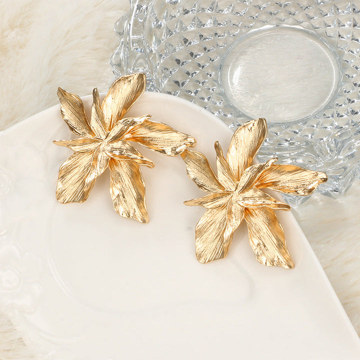 RADIANT FLOWER EARRINGS