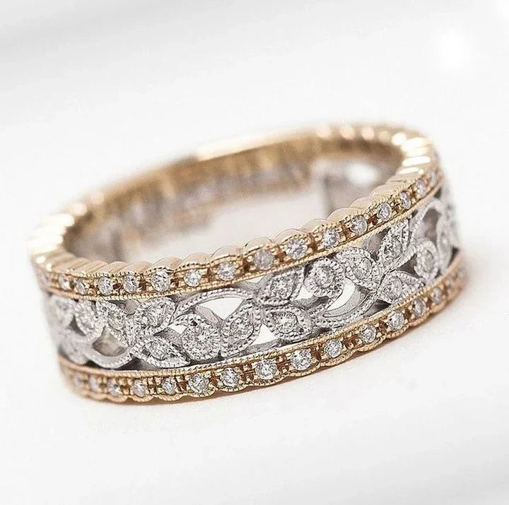 Hollow ring with diamonds in gold and antique silver