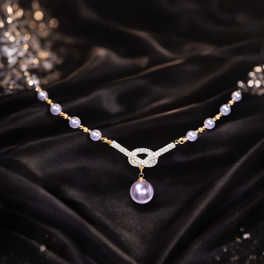 Eterna Pearl Knot Necklace