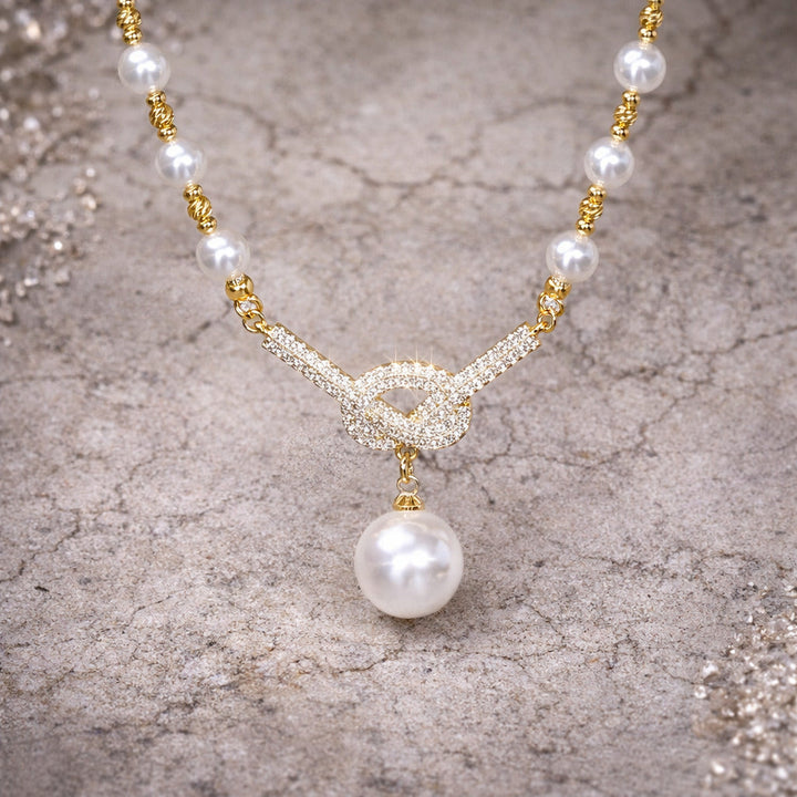Eterna Pearl Knot Necklace