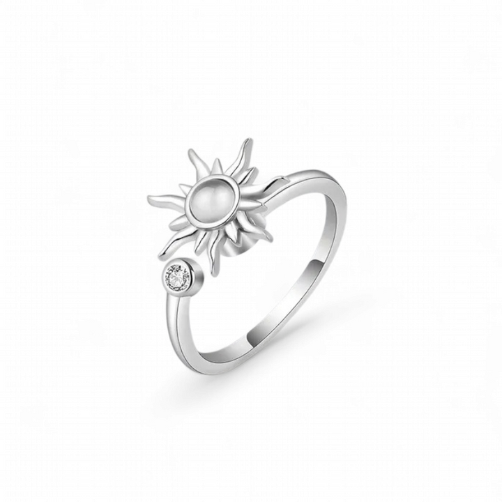 Rotating fidget anti-stress sun ring with white opal in silver-plated copper