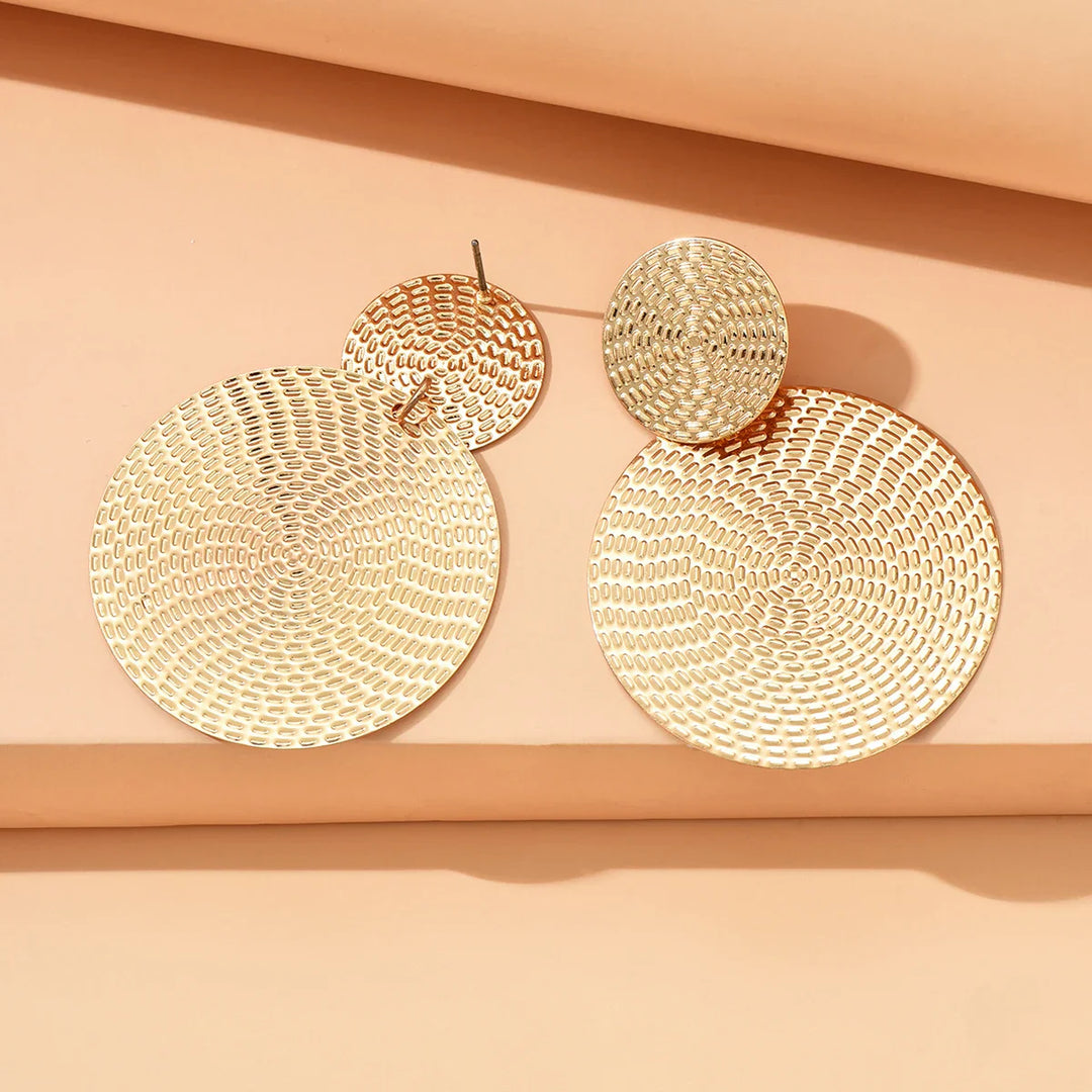 Calvera Bold Spiral Medallion Earrings
