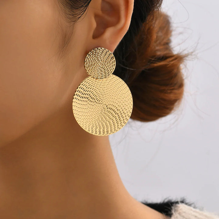 Calvera Bold Spiral Medallion Earrings