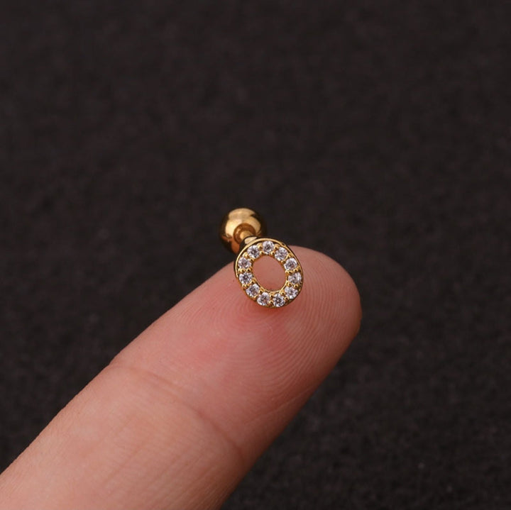 Letter earrings with zirconias and ball lock in 18 karat gold-plated stainless steel