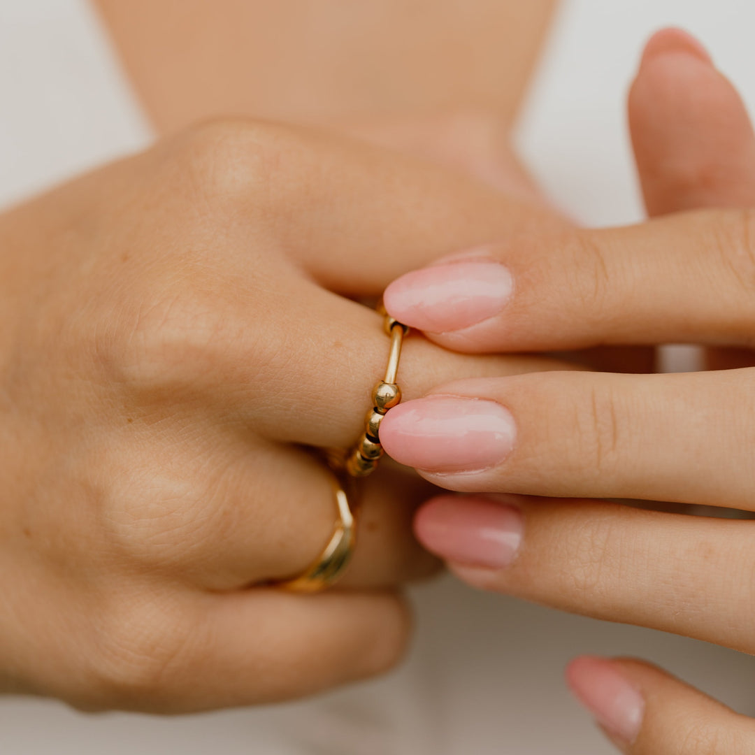 Fidget antistress ring in 18 karat gold-plated stainless steel