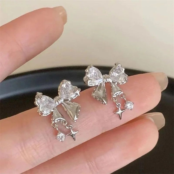 Bow Me Tiny Earrings