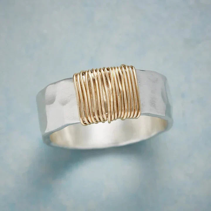Vintage Silver Ring Adorned with a Golden Wire