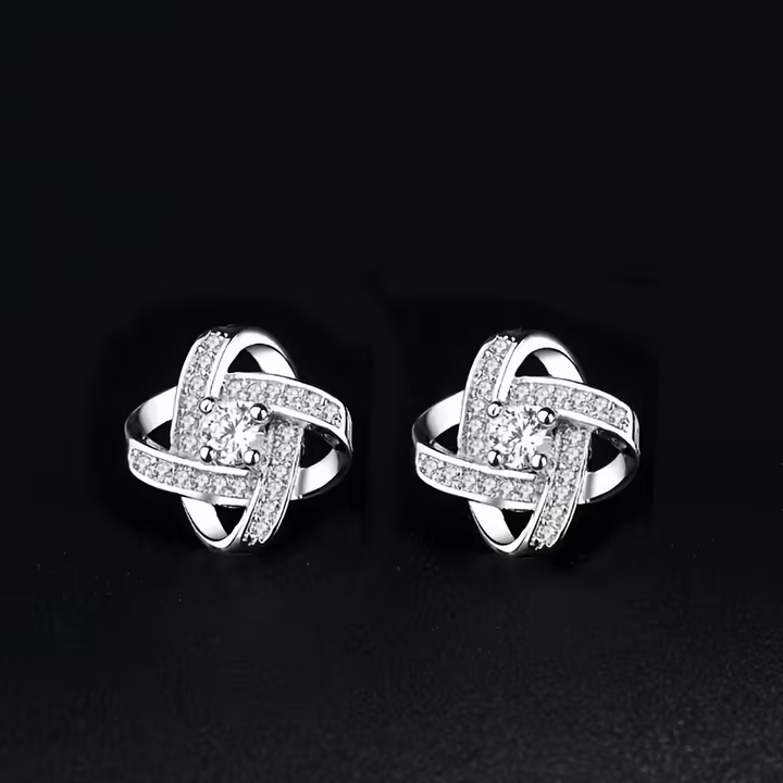 Twisted Orbit Silver Earrings