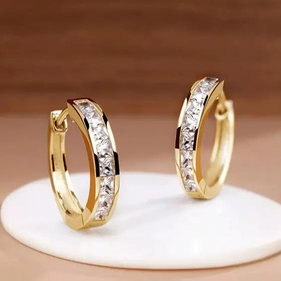 Elegant Gold Earrings Adorned with Crystals