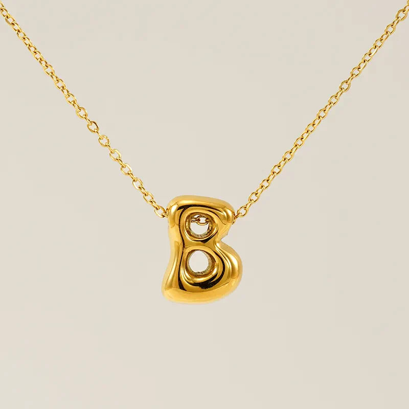 Necklace with balloon letters in 18 karat gold-plated stainless steel