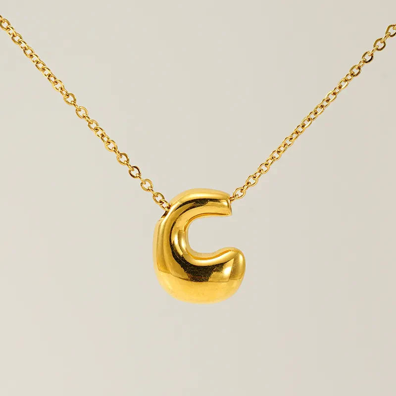 Necklace with balloon letters in 18 karat gold-plated stainless steel