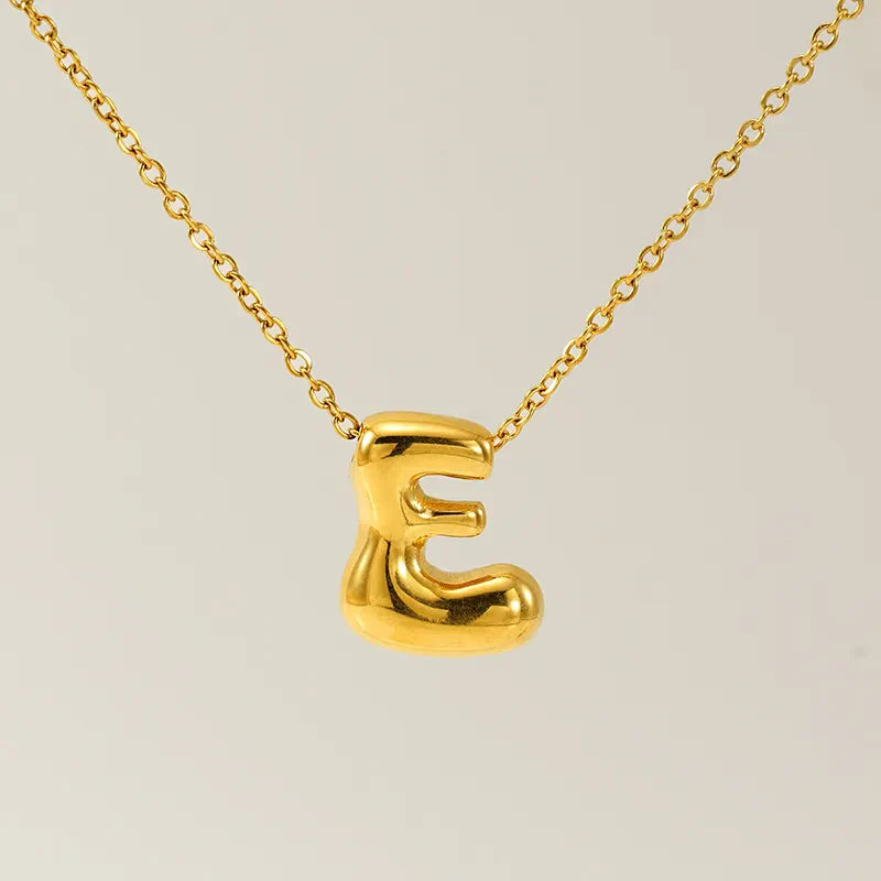 Necklace with balloon letters in 18 karat gold-plated stainless steel