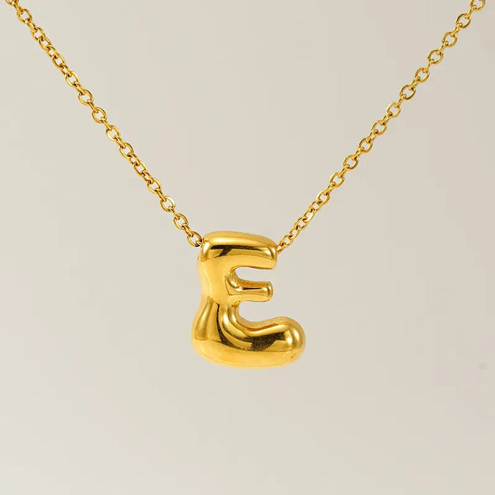 Necklace with balloon letters in 18 karat gold-plated stainless steel