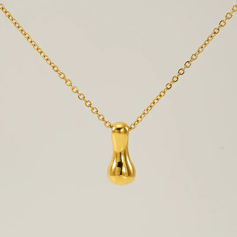 Necklace with balloon letters in 18 karat gold-plated stainless steel