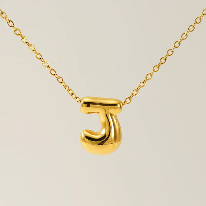 Necklace with balloon letters in 18 karat gold-plated stainless steel