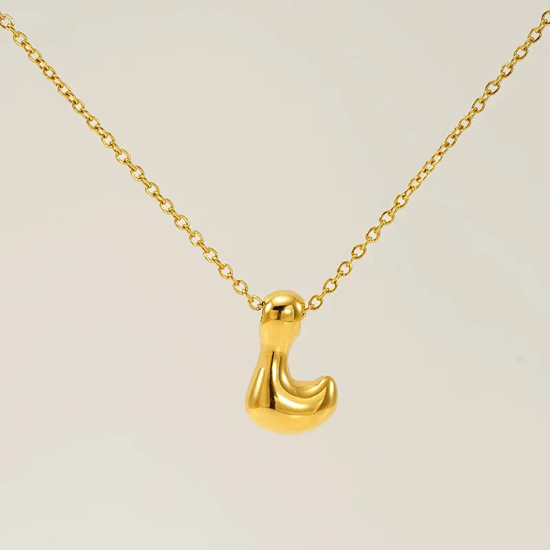 Necklace with balloon letters in 18 karat gold-plated stainless steel
