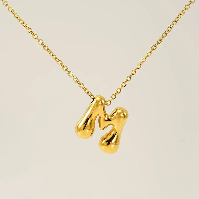 Necklace with balloon letters in 18 karat gold-plated stainless steel