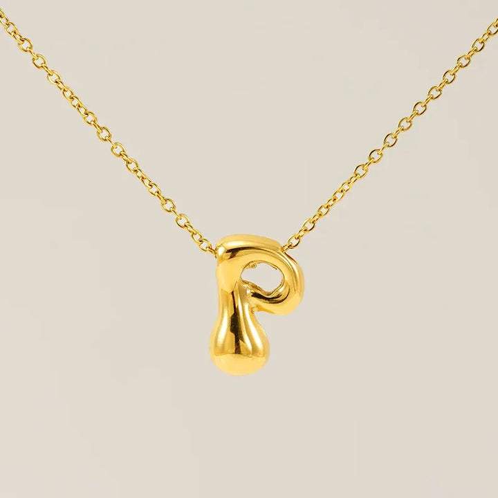 Necklace with balloon letters in 18 karat gold-plated stainless steel