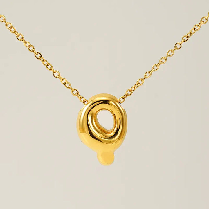 Necklace with balloon letters in 18 karat gold-plated stainless steel
