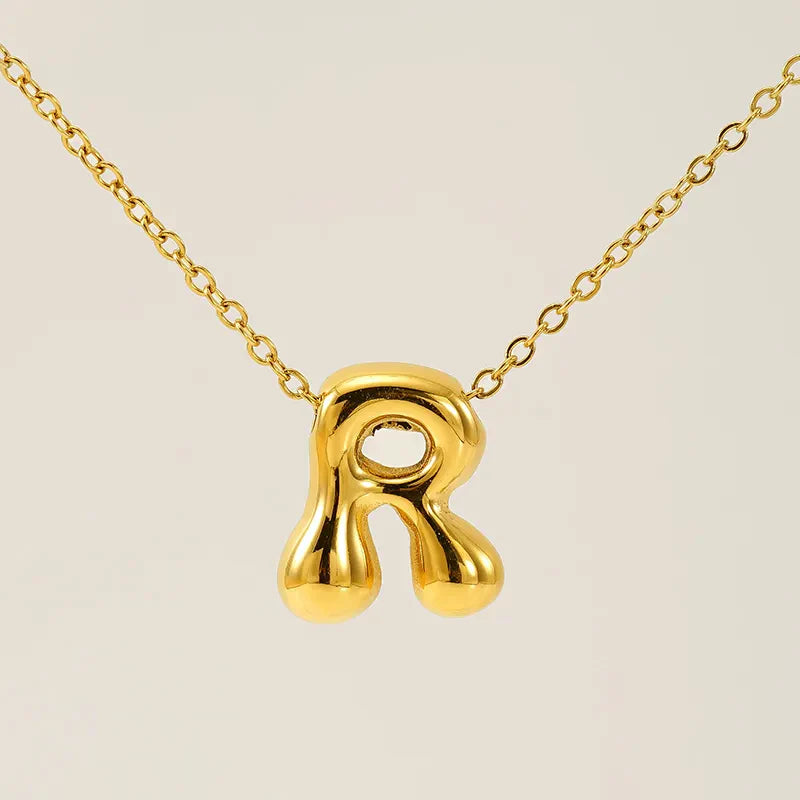 Necklace with balloon letters in 18 karat gold-plated stainless steel