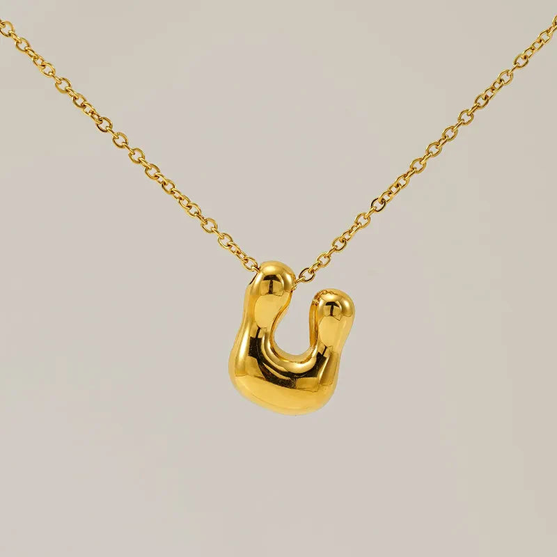 Necklace with balloon letters in 18 karat gold-plated stainless steel
