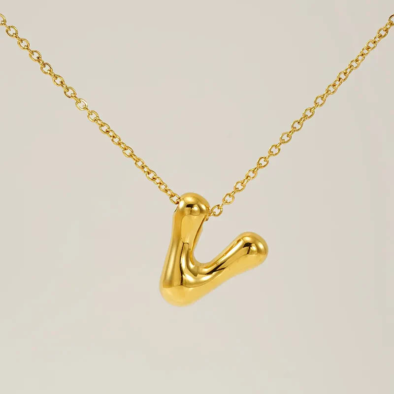 Necklace with balloon letters in 18 karat gold-plated stainless steel