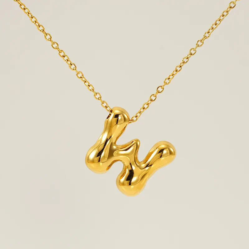 Necklace with balloon letters in 18 karat gold-plated stainless steel