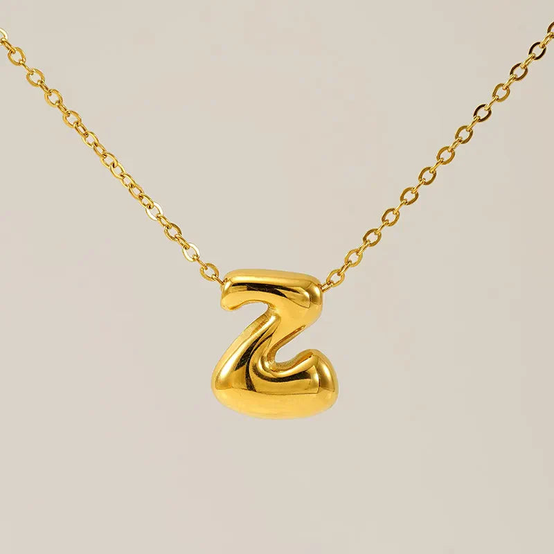Necklace with balloon letters in 18 karat gold-plated stainless steel